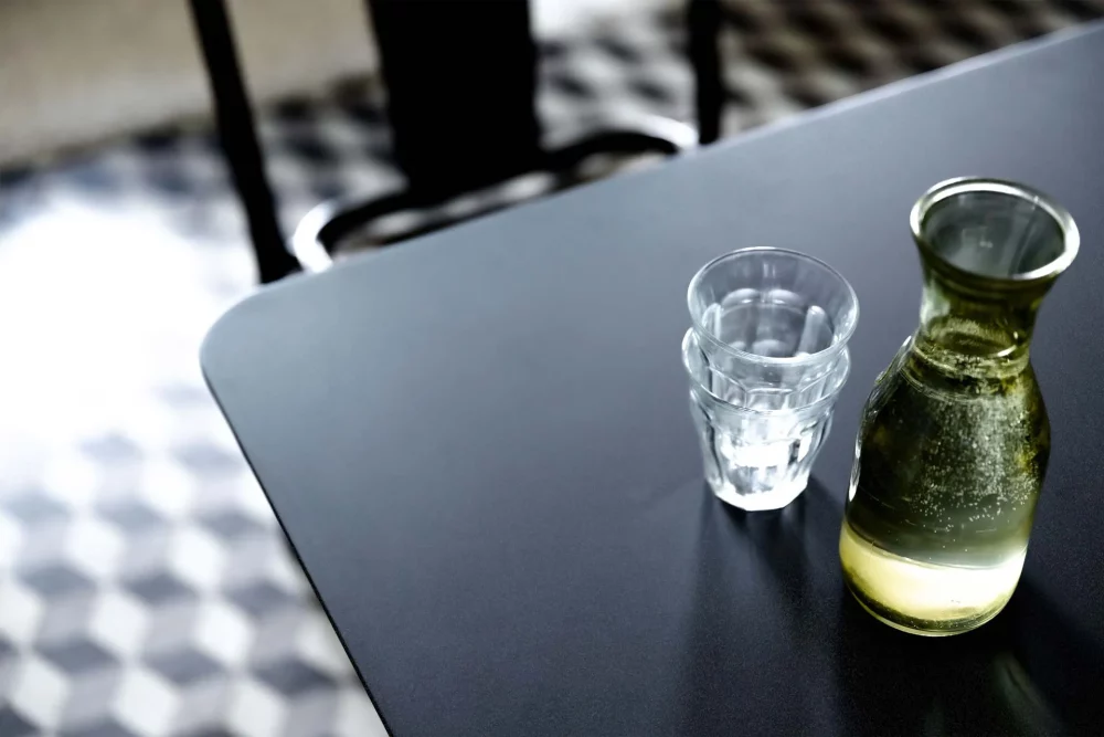 The corners of the rectangular top of the Donut table are rounded