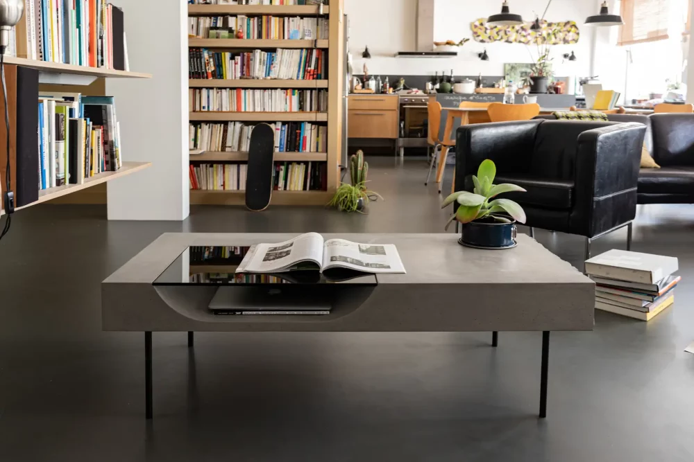 Concrete coffee table with glass tray inspired by the Bauhaus school